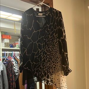 Chico’s blouse size 1. Layered v neck elegant blouse.